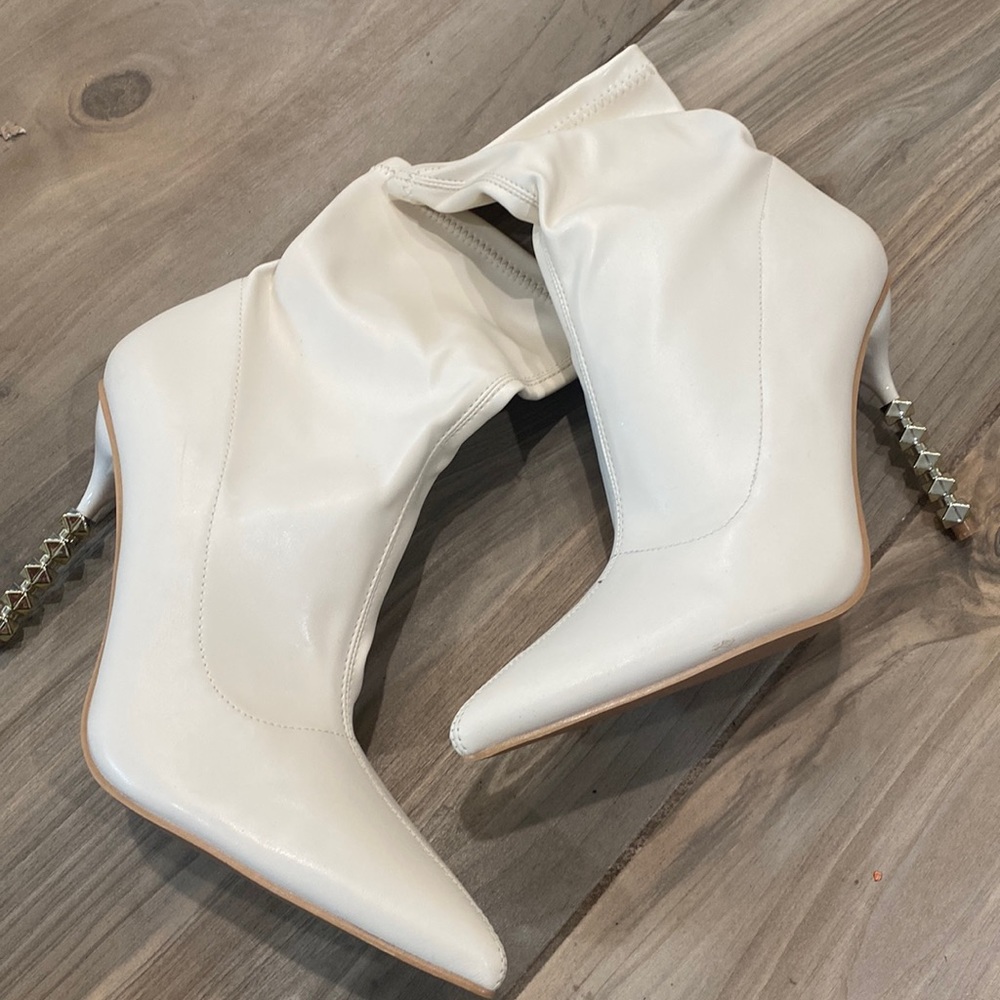 Brand new heeled boots